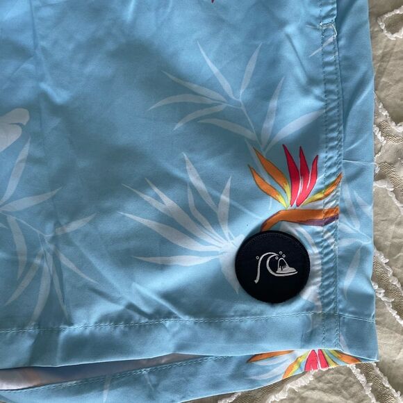 Quiksilver Blue and Orange Swim Trunks with Tropical Floral Design - Picture 3 of 7